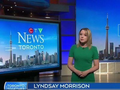 A news anchor standing in front of the CTV logo.